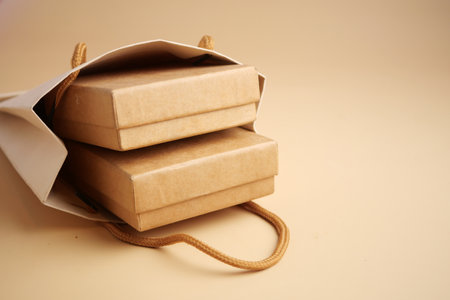 Packed boxes in a gift bag on a light backgroundの写真素材