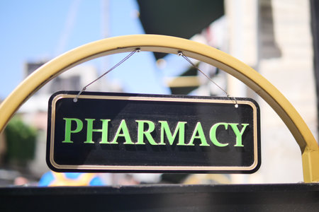 Pharmacy sign displayed outside a health storeの写真素材