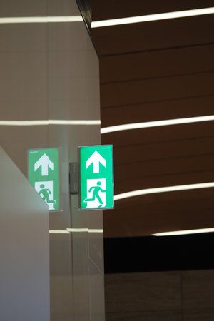 Emergency exit sign guiding to safetyの写真素材