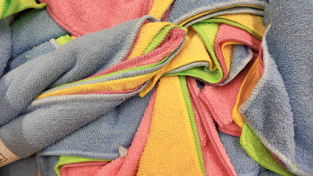 Colorful towels stacked for cleaning or organizing
