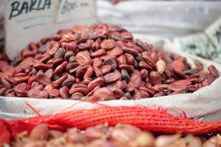 Cacao beans in a vibrant market settingの写真素材