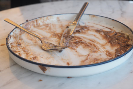 Dessert plate with remnants of delicious cakeの写真素材