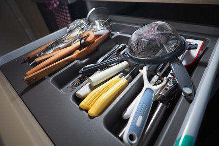 Kitchen utensils organized in a drawer ready for useの写真素材