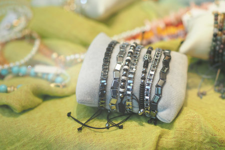 Display of bracelets on a soft platform at a marketの写真素材