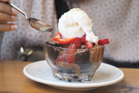 Chocolate dessert with strawberries and ice creamの写真素材