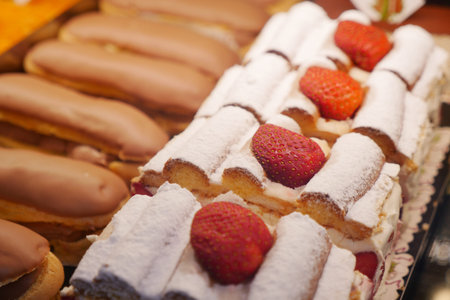 Pastry display with strawberries at a bakery shop