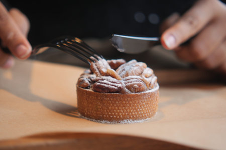 Enjoying dessert at a dining table in a cafe