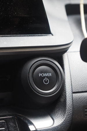 Power button in a car dashboard setup