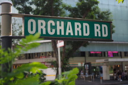 singapore orchard road 2 february 2025. Orchard Road street sign in a busy urban areaのeditorial素材