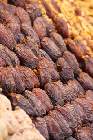 Dates and nuts in a market display from a local vendorの写真素材