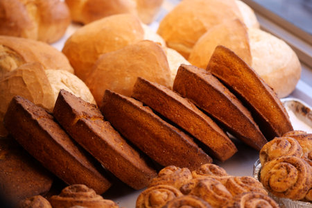 Bakery display with various bread and pastries in a shop