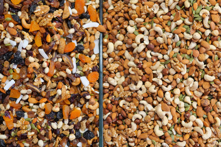 Mixed nuts and dried fruits on display in a market