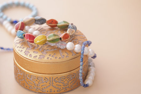Colorful jewelry on a decorative boxの写真素材