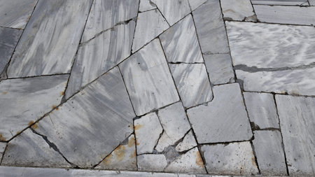 Marble floor with cracks in a public space