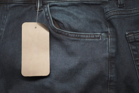 Jeans with price tag in a clothing store setting