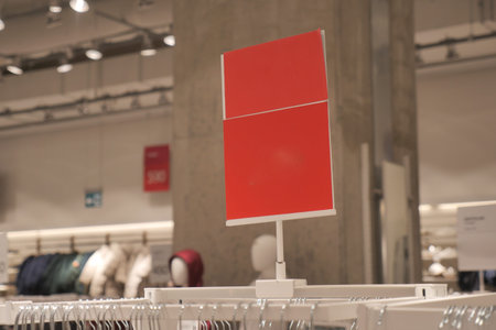 Display sign stands in a retail store during business hours
