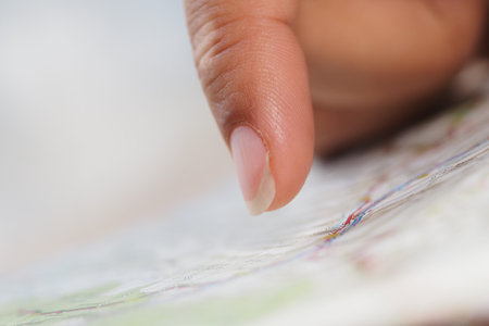 Finding a location on a map with a finger