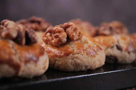 Baking cookies with walnuts on a kitchen counter