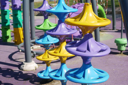 Colorful playground equipment in a park setting