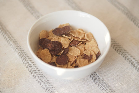 Bowl of cereal on a table ready for breakfast or snack