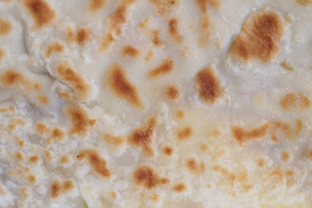 Freshly baked flatbread displayed on a surface