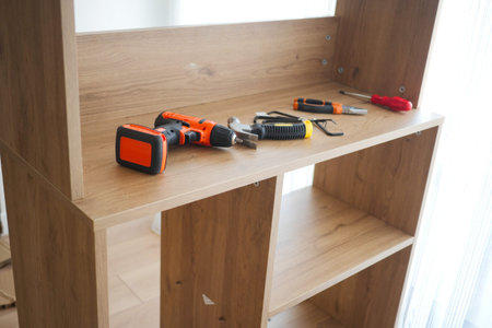 Building a shelf with tools in a room