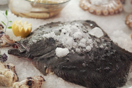 Fresh fish on ice at local market in the morning