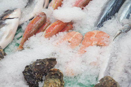 Fresh fish and seafood display at market near the coast