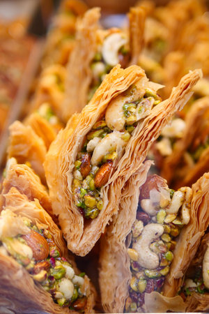 Baklava with nuts served at a market stall in the afternoon