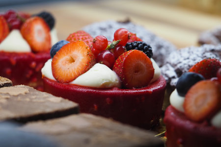 Delicious dessert with berries on a wooden table