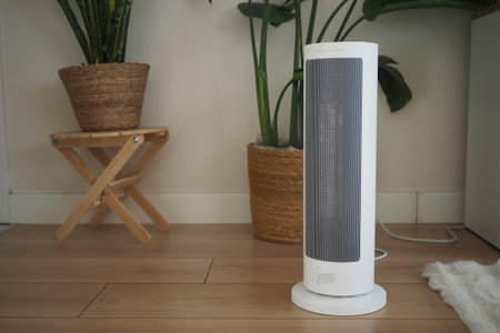 Standing heater near plants in a room setting