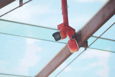 Security camera is mounted on the roof of a building