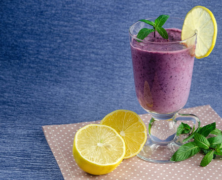 healthy food, fresh smoothies from currants and bluhealthy food, fresh smoothies from currants and blueberries with lemon, vitamin bombeberries with lemonの写真素材