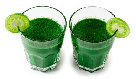 green smoothies with fresh vegetables and fruits, healthy nutrition concept, isolated on white backgroundの写真素材