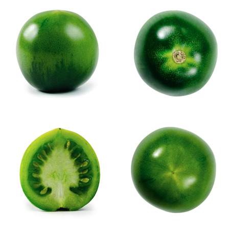 collection of few green tomatoes, different views, isolated on white backgroundの写真素材