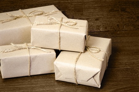 gift wrapping from Kraft paper wrapped with twine, the concept of handmadeの写真素材