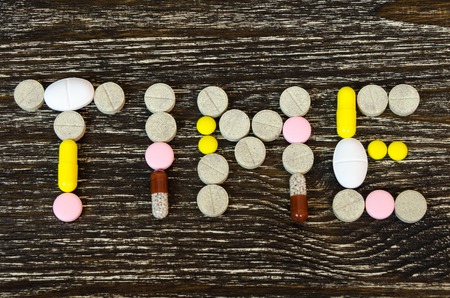 concept of tablets in form of text - timeの写真素材