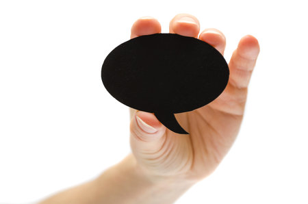 hand of young girl holding speech bubble. Isolated on white background