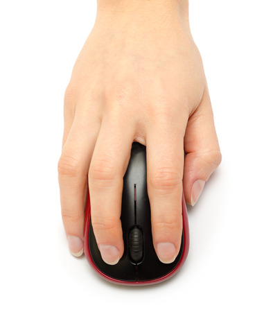 woman hand holding computer mouse. Isolated on white backgroundの写真素材