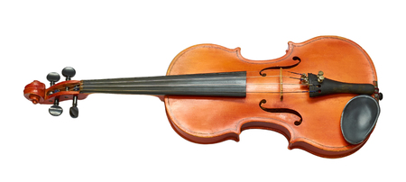 vintage violin worn by time and music masters. Isolated on white backgroundの写真素材