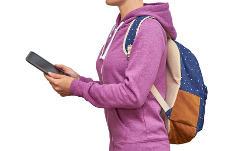 Girl with a digital tablet in hand. isolated on white background.