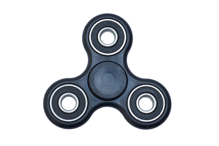 Black Fidget Spinner isolated on white background.の写真素材