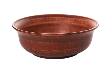 clay empty brown bowl isolated on white background.の写真素材