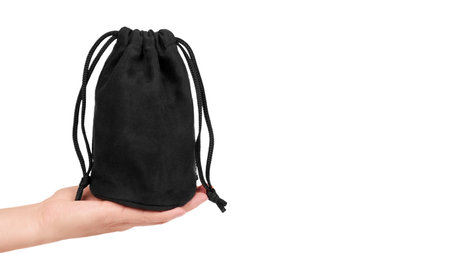 Black textile sack isolated on white background . copy space, template.の写真素材