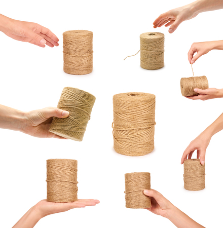 set of different Spool of bale twine with hand, isolated on white background.の写真素材