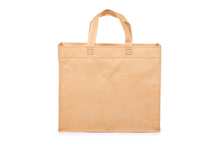 Reusable paper bag for groceries or gifts, copy space, isolated on white background.の写真素材