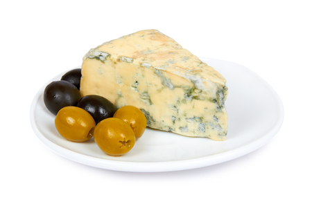 Piece of milky blue cheese with olives, isolated on white background.の写真素材
