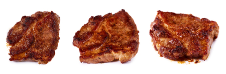set of different grilled meat steak with spices. Isolated on white background.の写真素材