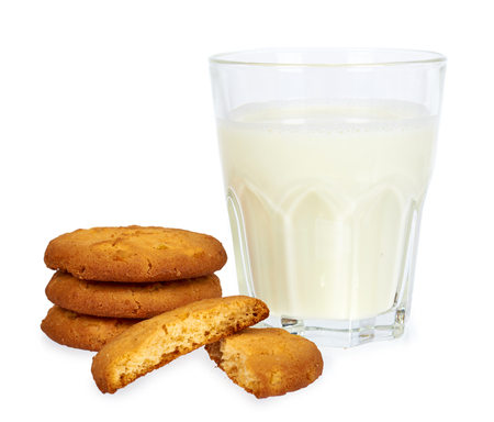 Glass of milk and homemade cookies isolated on white background.の写真素材