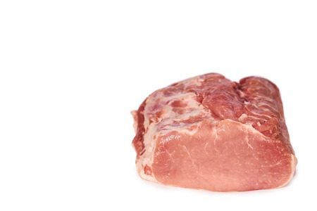 Fresh Pork meat slice. Isolated on a white background, copy space template.の写真素材